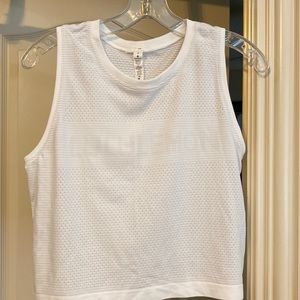 Lululemon white tank top with lululemon across the chest. Size 6